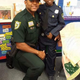 Palm Beach County Sheriff’s Deputy Fernandas Jones poses with an unidentified child dressed as an officer.
Palm Beach County Sheriff’s Office viai Twitter